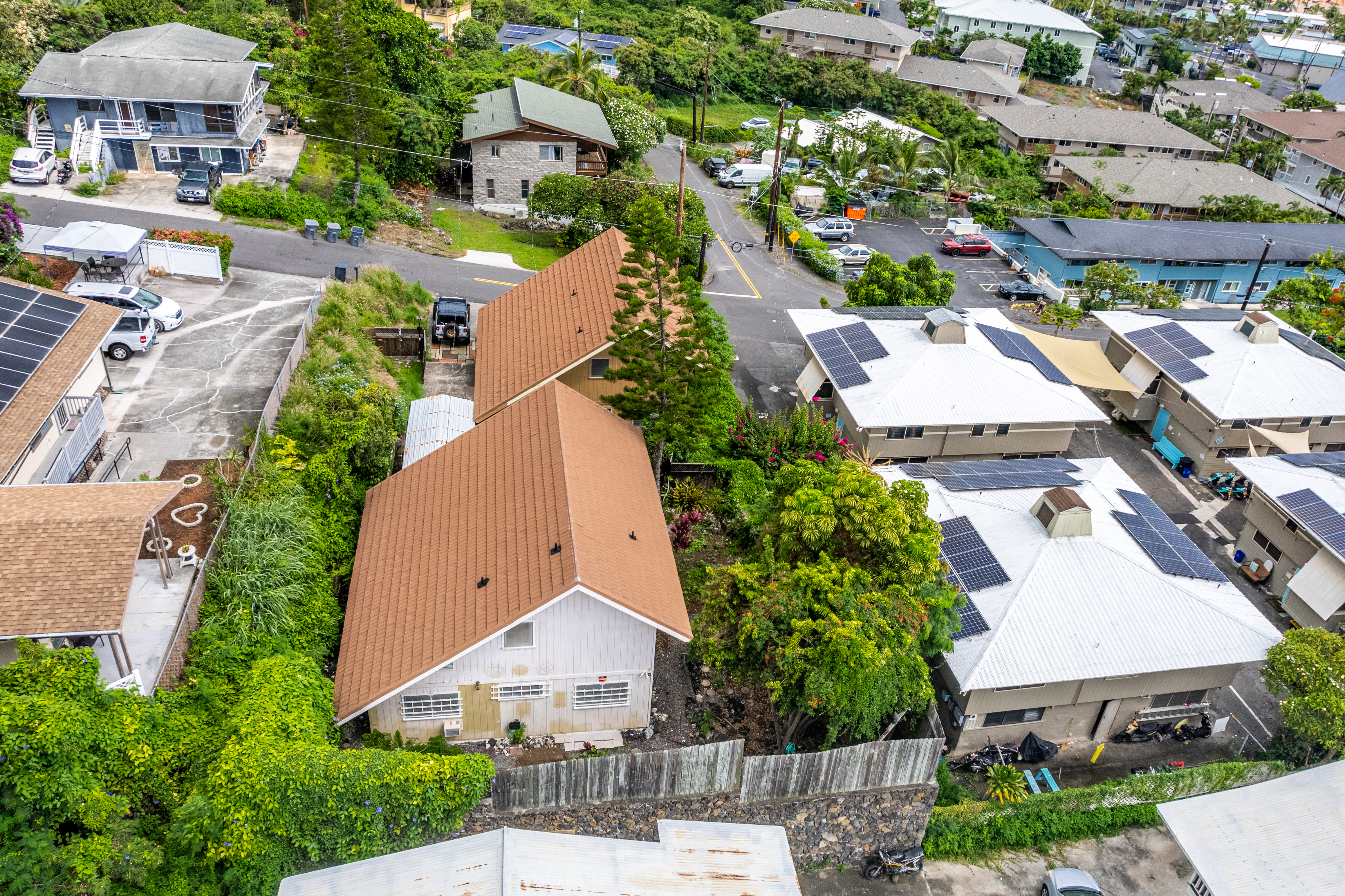 75-185-b Alakai Street, Unit B Kailua-Kona, HI 96740 - Photo 20 of 27 an aerial view of a house with garden space and street view