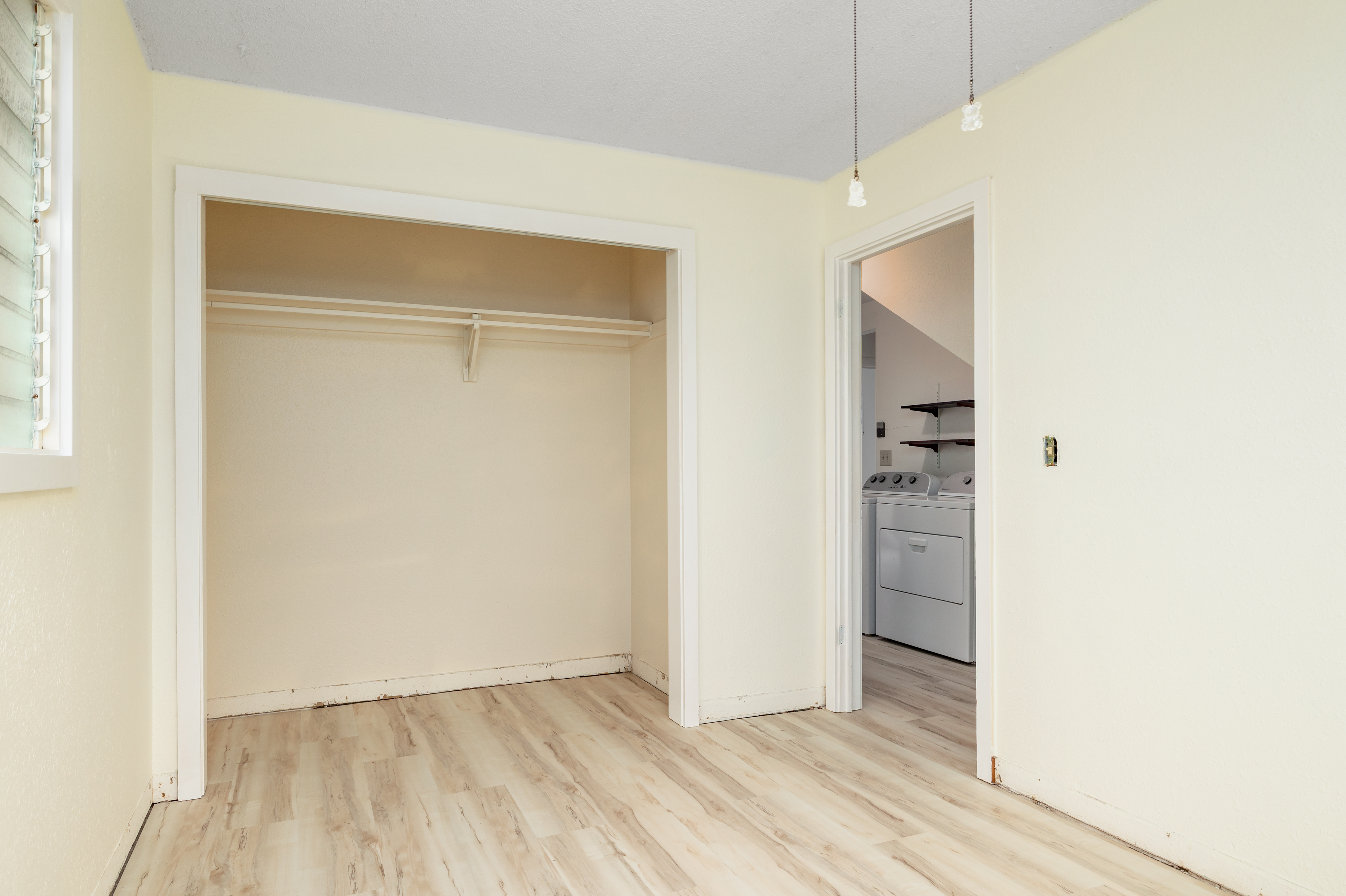 75-185-b Alakai Street, Unit B Kailua-Kona, HI 96740 - Photo 6 of 27 a view of an empty room with closet and a window