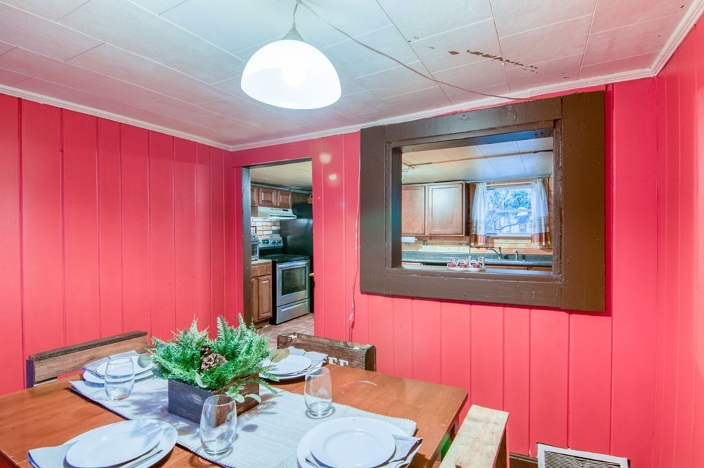 2 Three Rivers Road Wilbraham, MA 01095 - Photo 3 of 25 a view of a dining room with furniture and a potted plant