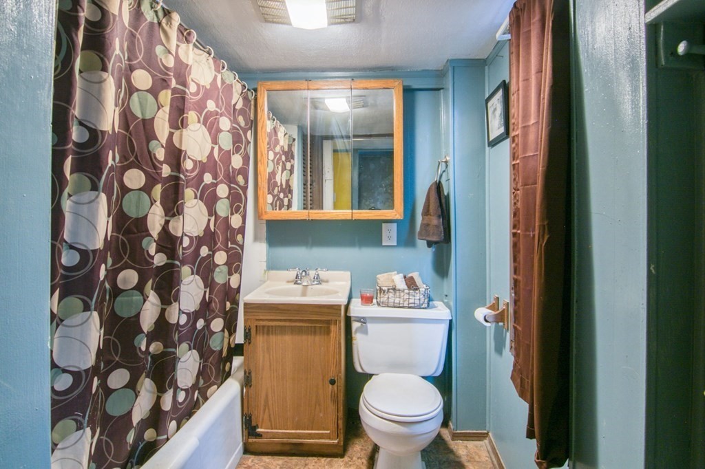 2 Three Rivers Road Wilbraham, MA 01095 - Photo 8 of 25 a bathroom with a toilet sink and mirror