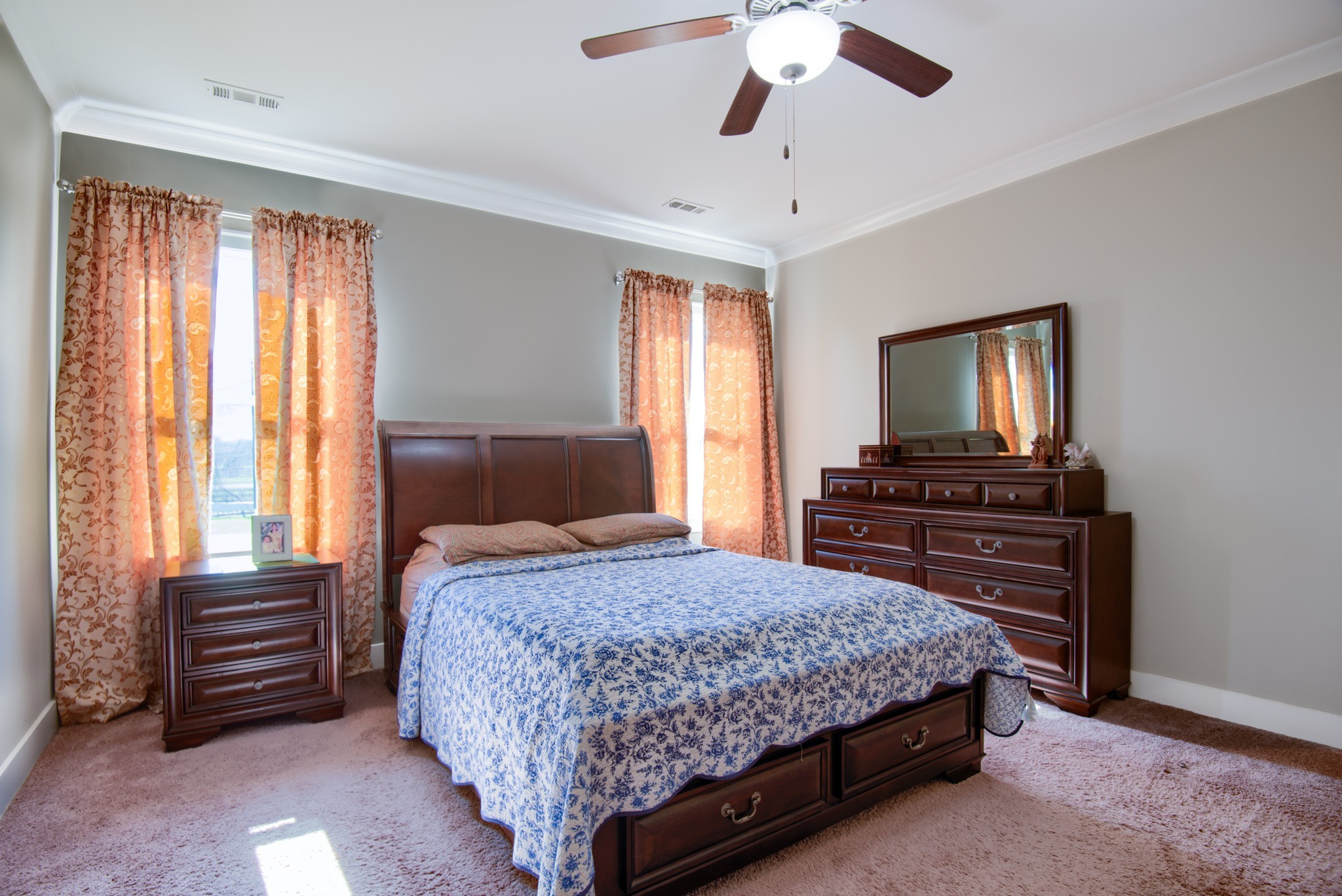 4019 Ryecroft Lane Franklin, TN 37064 - Photo 12 of 35 a bedroom with a bed and a flat screen tv