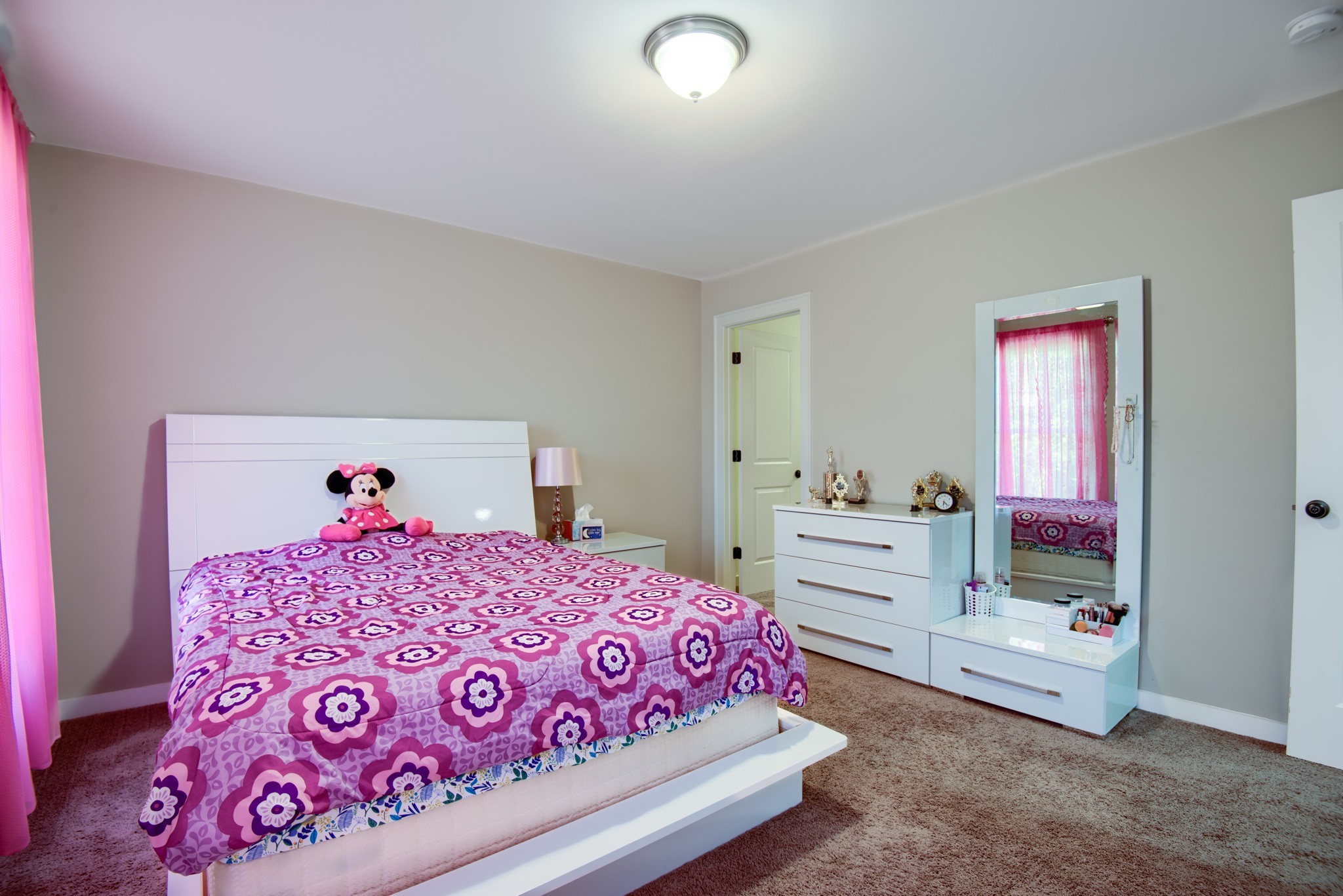 4019 Ryecroft Lane Franklin, TN 37064 - Photo 22 of 35 a bedroom with a bed and a dresser