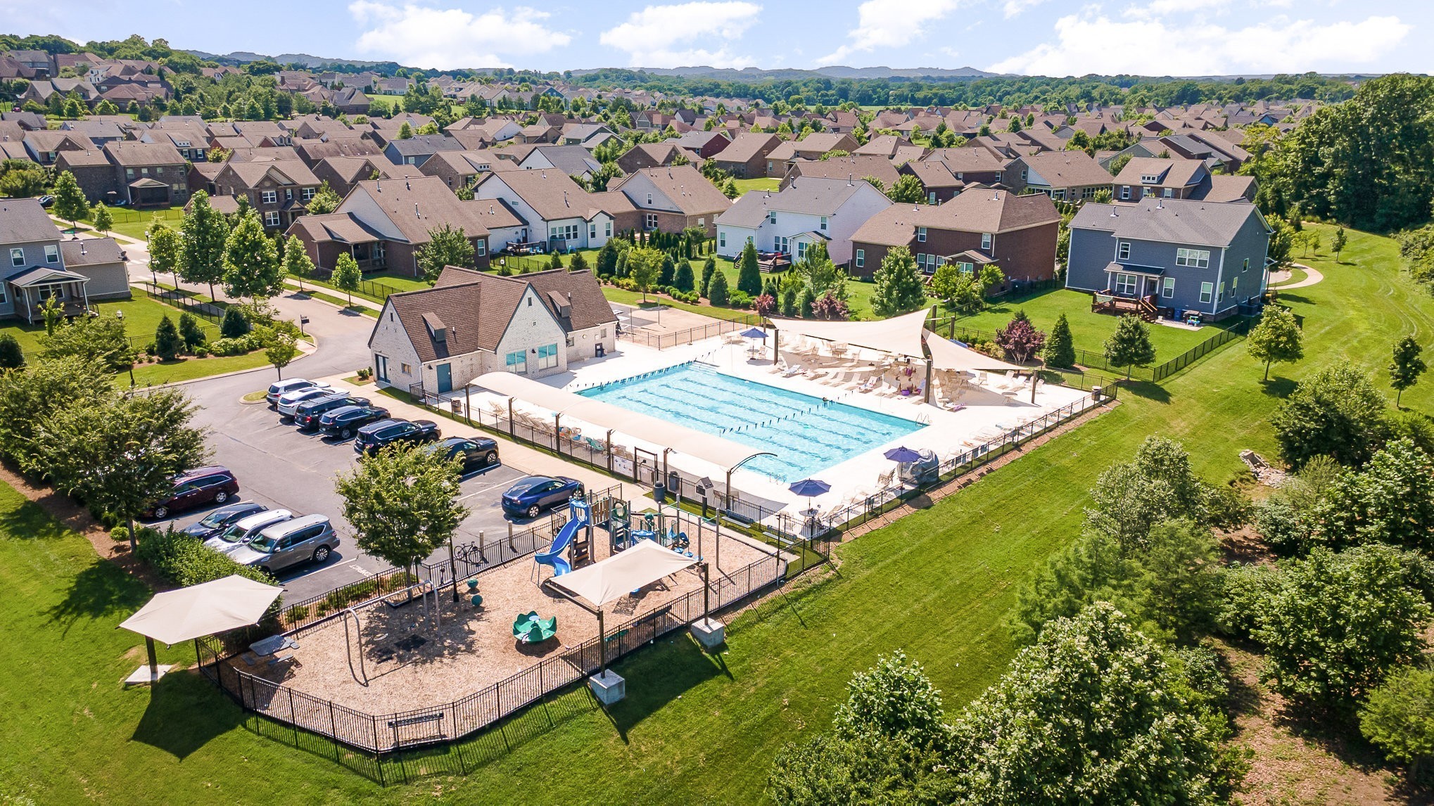 4019 Ryecroft Lane Franklin, TN 37064 - Photo 31 of 35 an aerial view of residential houses with outdoor space and swimming pool