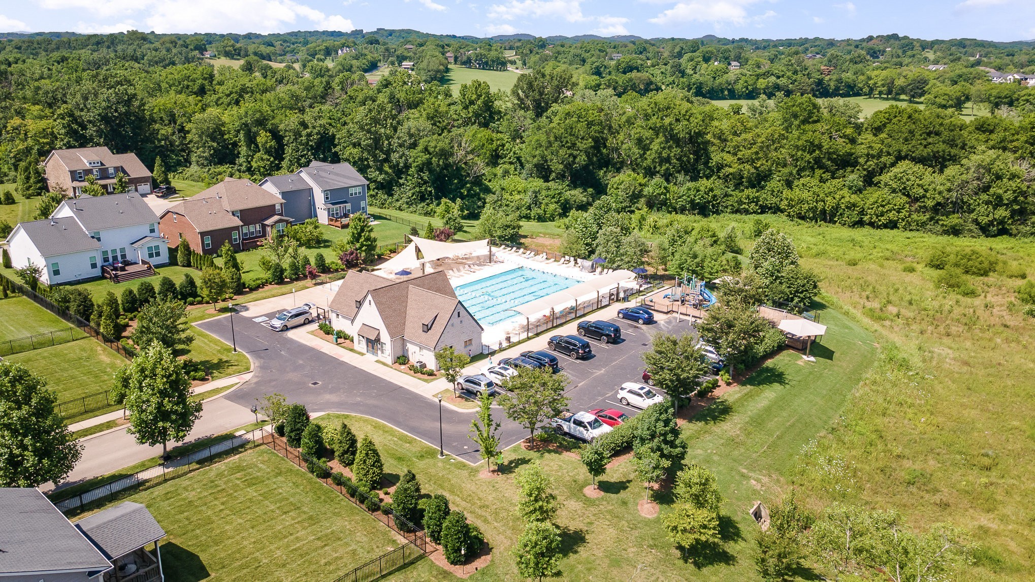 4019 Ryecroft Lane Franklin, TN 37064 - Photo 32 of 35 an aerial view of a house with a yard and lake view