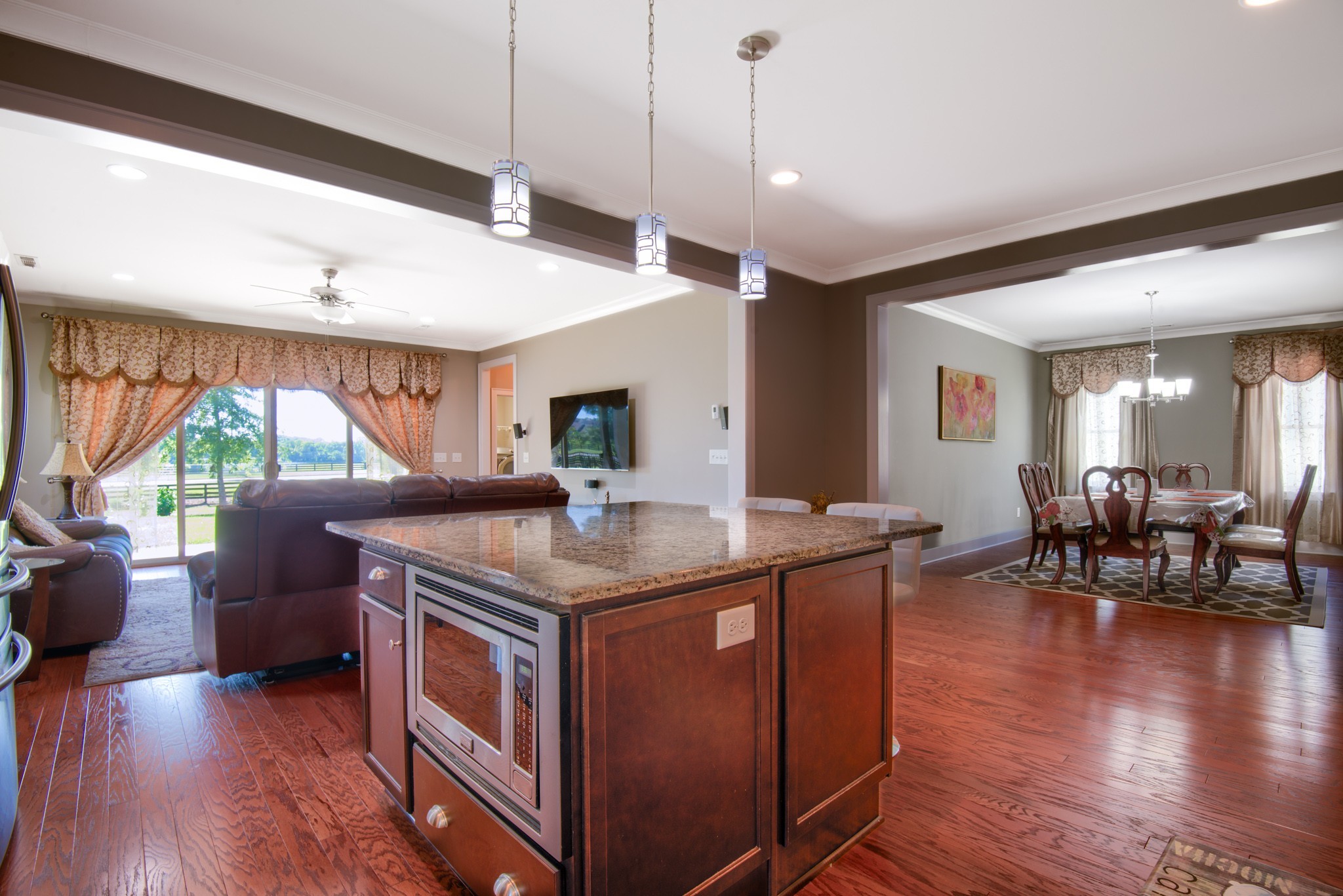 4019 Ryecroft Lane Franklin, TN 37064 - Photo 6 of 35 a kitchen with a stove and wooden floor