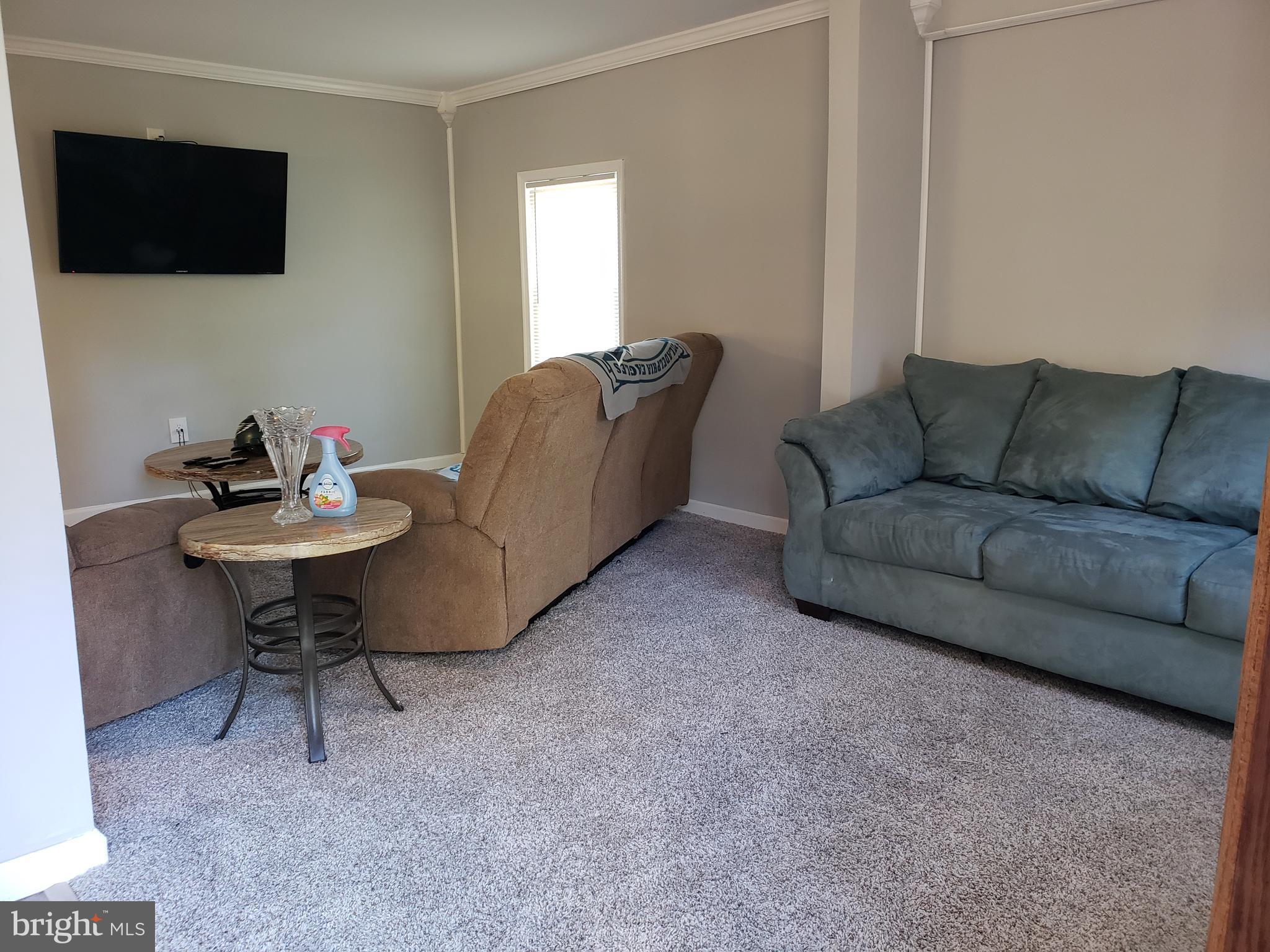 419 Berlin New Freedom Road Berlin, NJ 08009 - Photo 8 of 38 Sitting area expands LR & makes great play space
