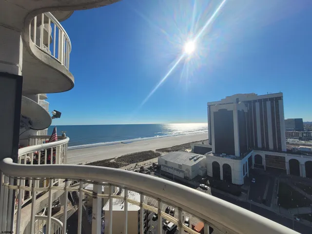 a bathroom with a toilet and a mirror