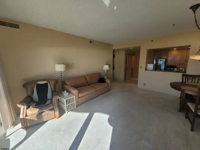 a kitchen that has a sink and a stove in it