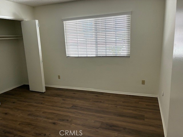 1612 South 7th Street, Unit B Alhambra, CA 91803 - Photo 5 of 6 an empty room with wooden floor and a window