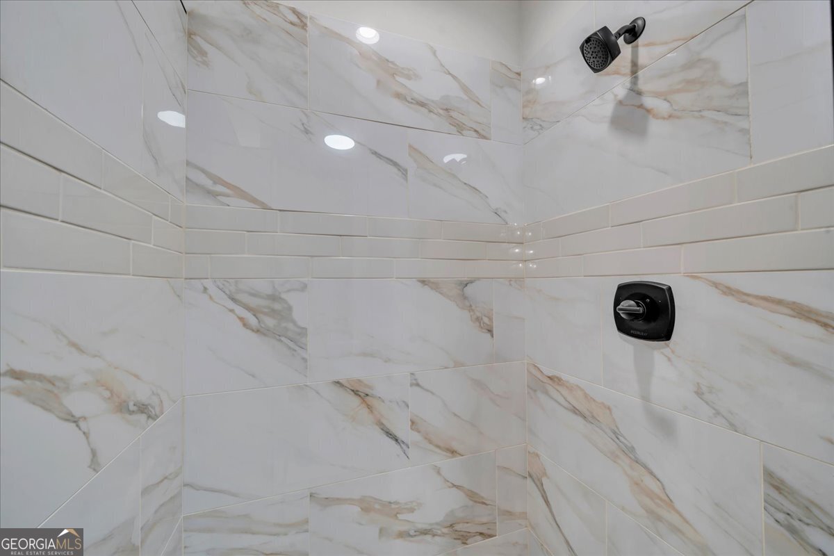 212 Eric Court Byron, GA 31008 - Photo 23 of 37 a view of a walk in closet