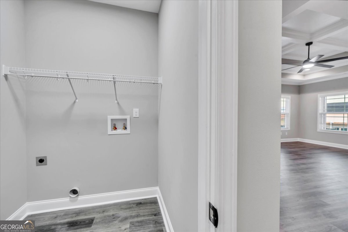212 Eric Court Byron, GA 31008 - Photo 25 of 37 a view of walk in closet with empty racks