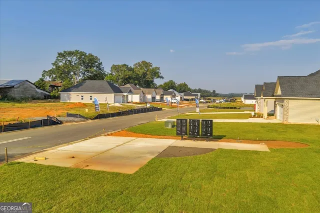 a view of a swimming pool with an ocean view