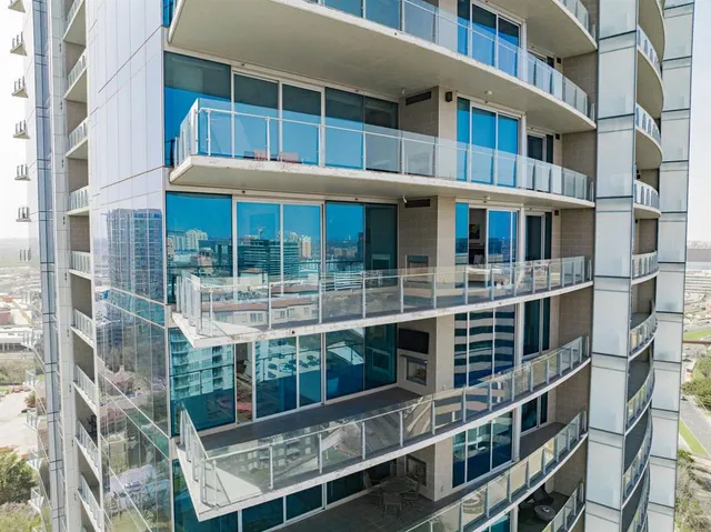 a front view of a building with glass windows