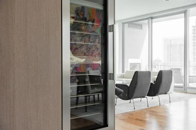 a room with a chair and a window