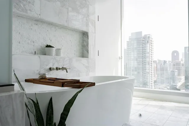 a kitchen with a sink a stove and a refrigerator