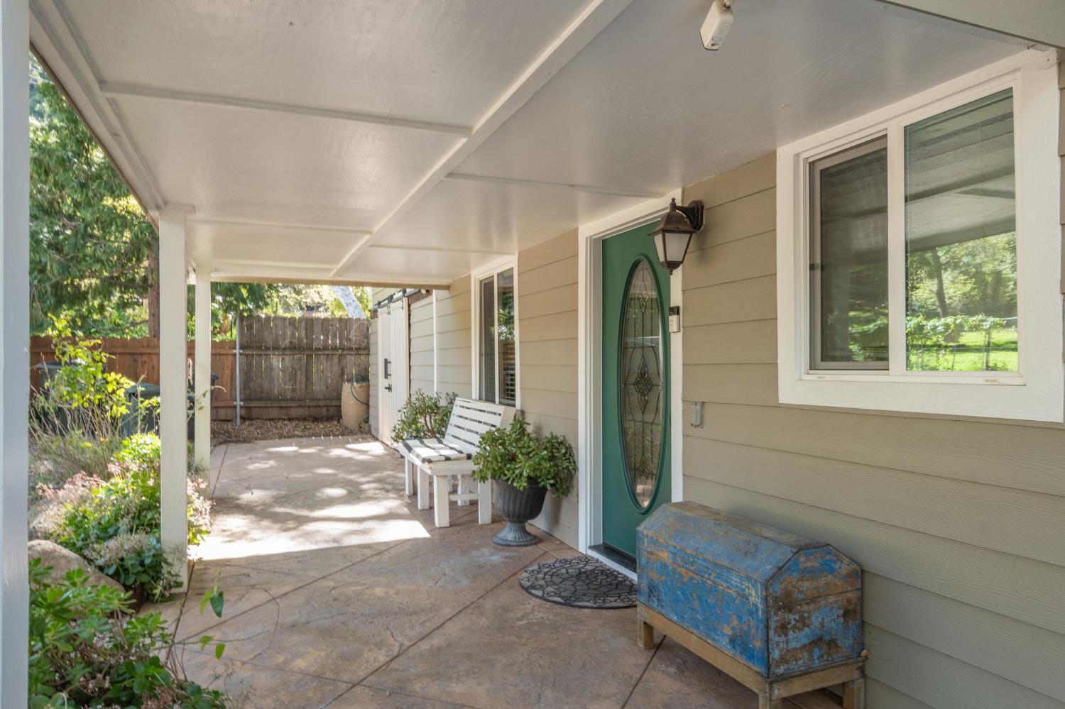 15663 Ojai Road Santa Paula, CA 93060 - Photo 3 of 47 a house view with a seating space and garden space