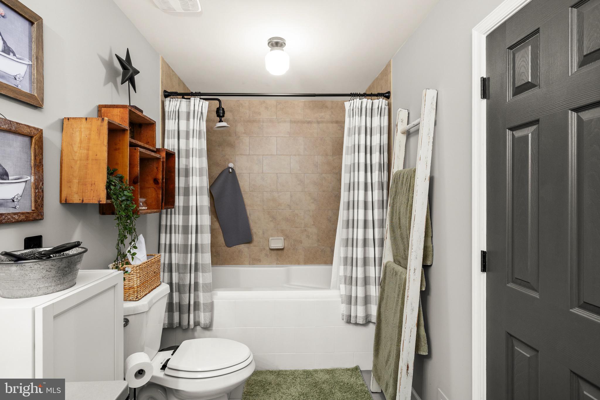 30367 Old Locust Grove Locust Grove, VA 22508 - Photo 19 of 36 a bathroom with a toilet and a shower