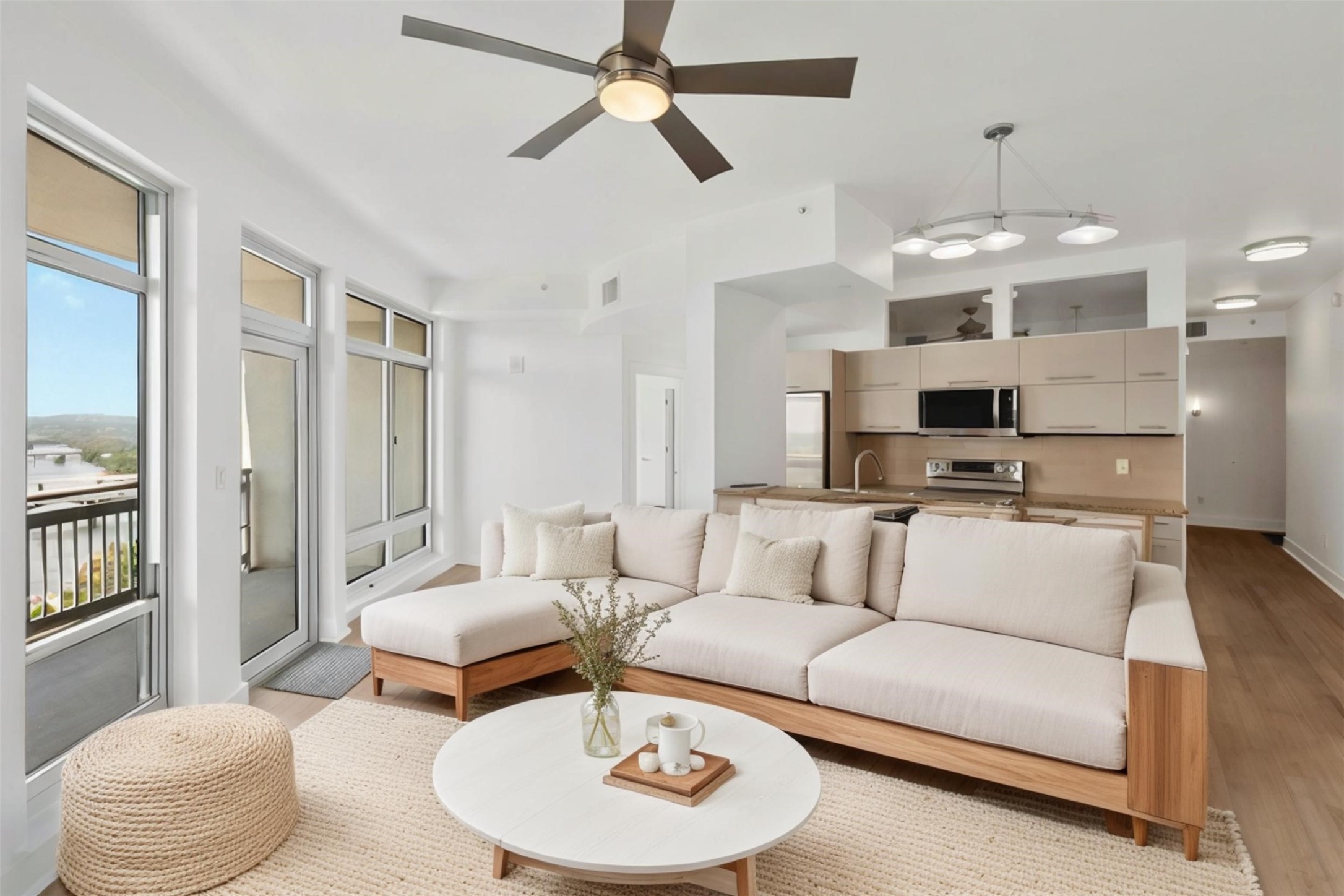 603 Davis Street, Unit 1910 Austin, TX 78701 - Photo 1 of 1 a living room with furniture and a dining table