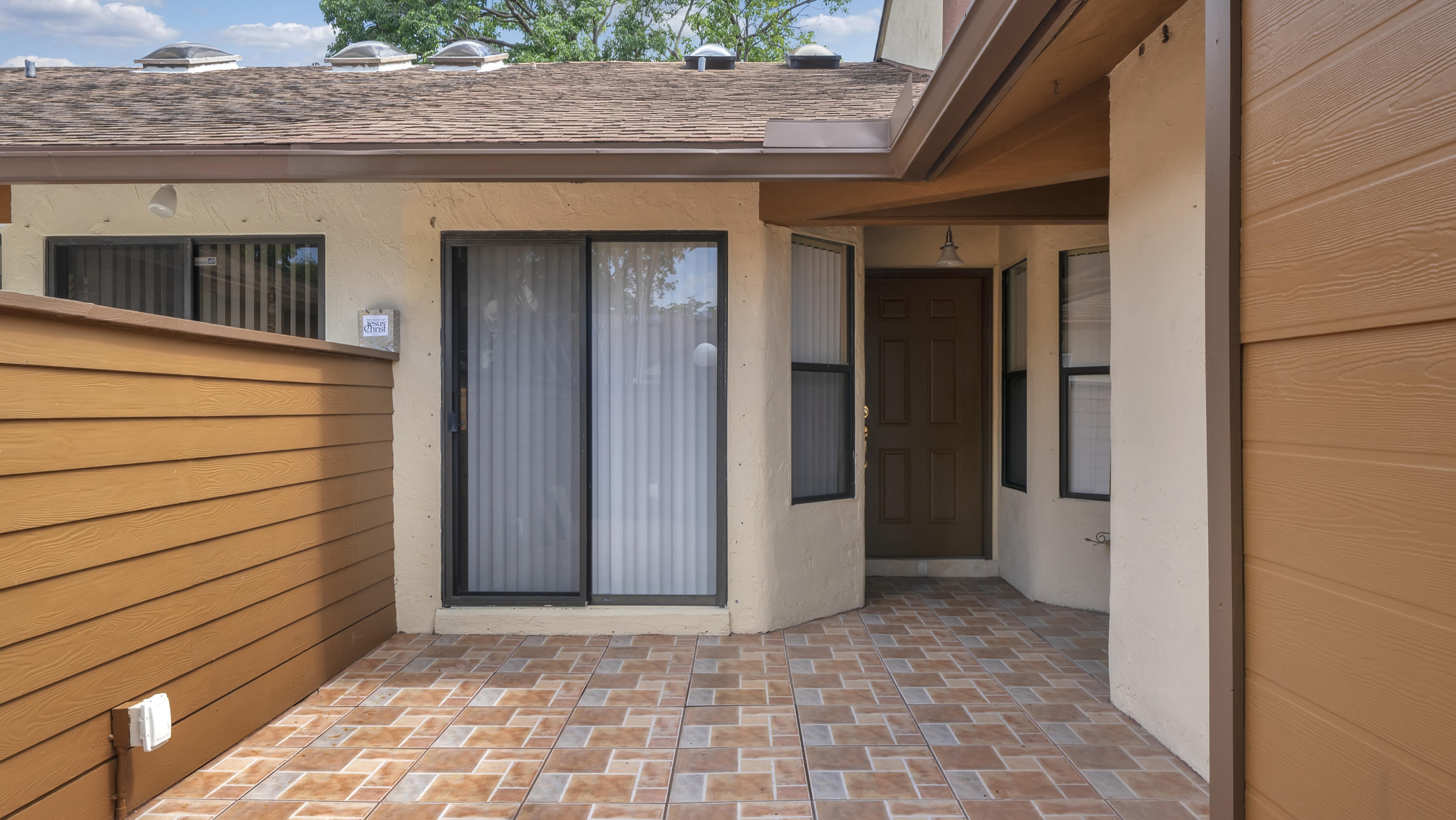 3765 Blue Ridge Road West Palm Beach, FL 33406 - Photo 3 of 15 a view of a pathway door