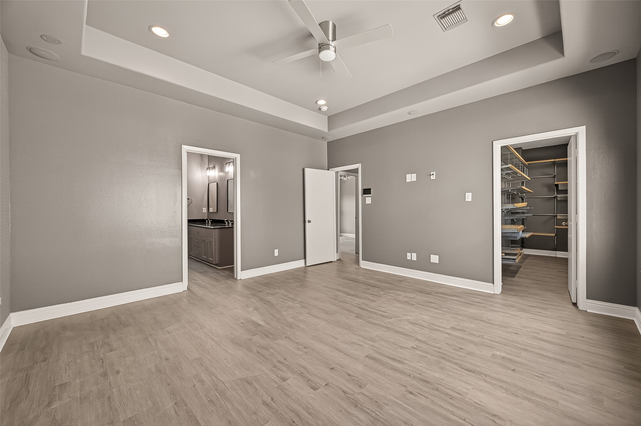 1107 St Charles Street Houston, TX 77003 - Photo 23 of 37 wooden floor in an empty room with a window