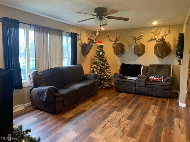 4713 Highway 534 Rome, OH 44085 - Photo 11 of 21 Living room with dark wood-type flooring and ceiling fan