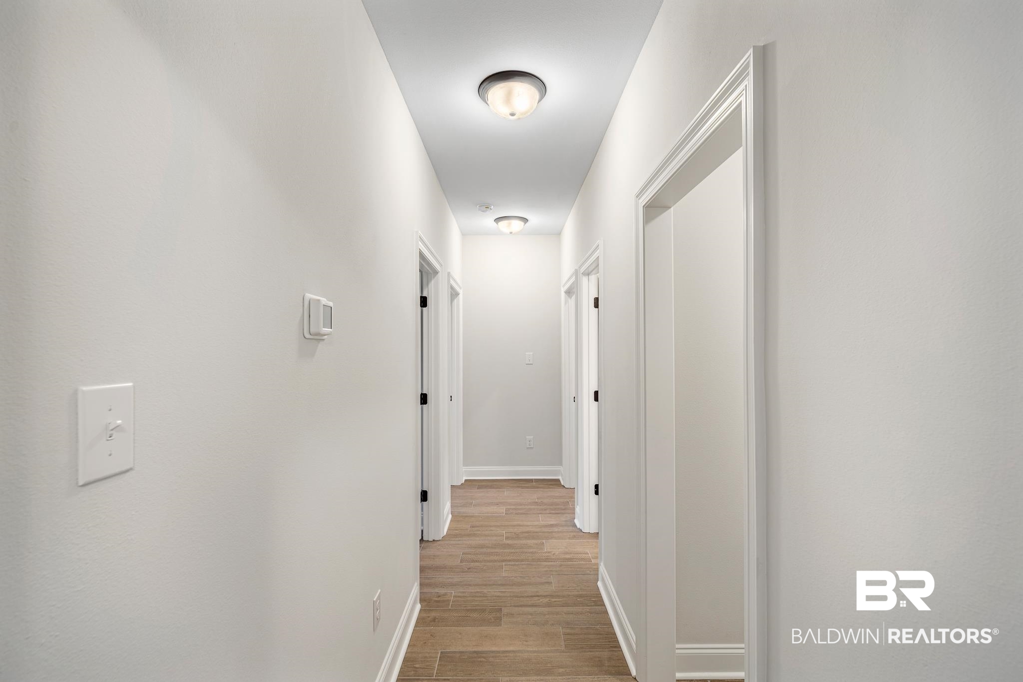 9997 Dunleith Loop Daphne, AL 36526 - Photo 18 of 29 Hallway to Bedrooms