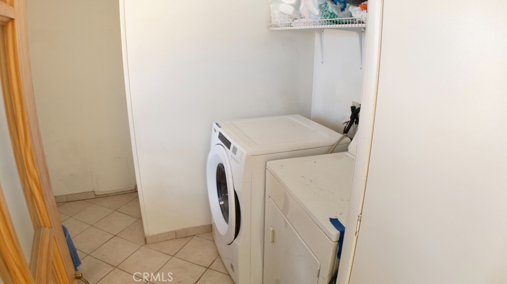 8130 Camp Rock Road Lucerne Valley, CA 92356 - Photo 14 of 14 a utility room with dryer and washer