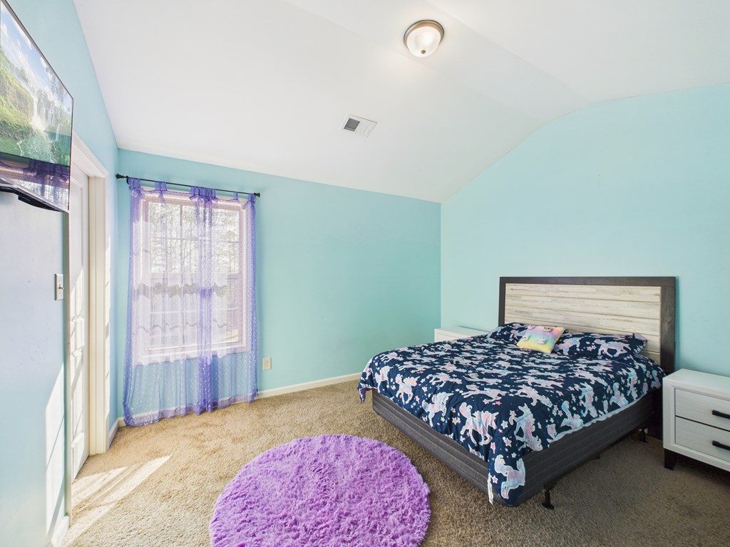 783 Sweetbay Parkway Hamilton, GA 31811 - Photo 30 of 46 a bedroom with a bed and a window