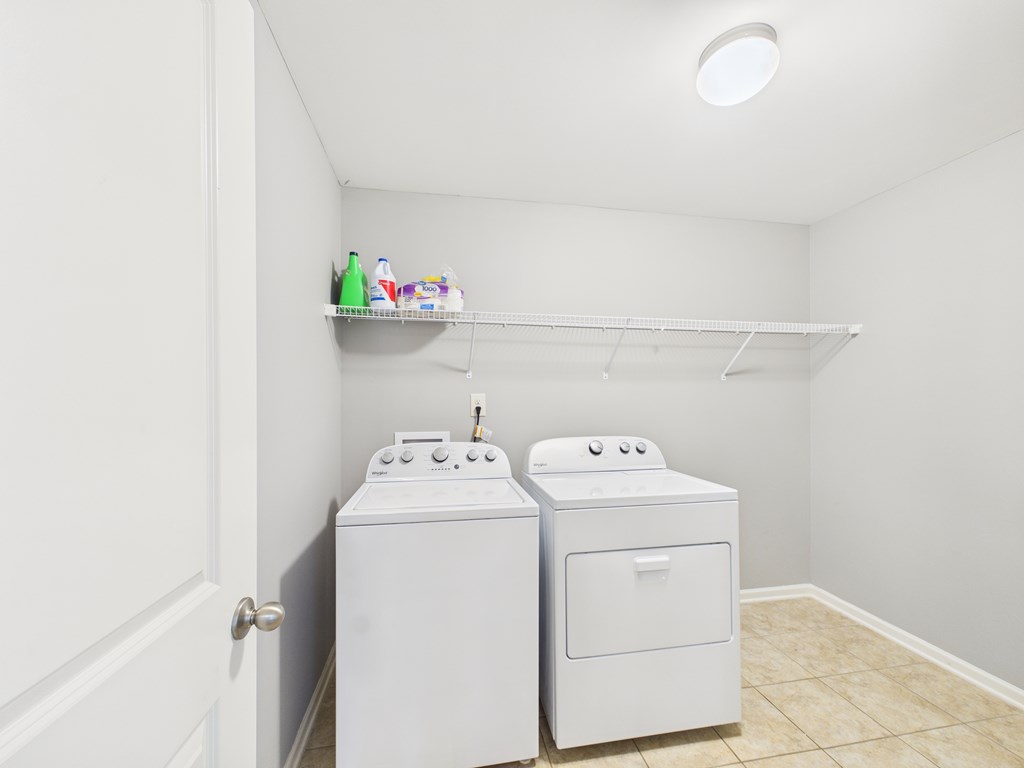 783 Sweetbay Parkway Hamilton, GA 31811 - Photo 32 of 46 a utility room with dryer and washer
