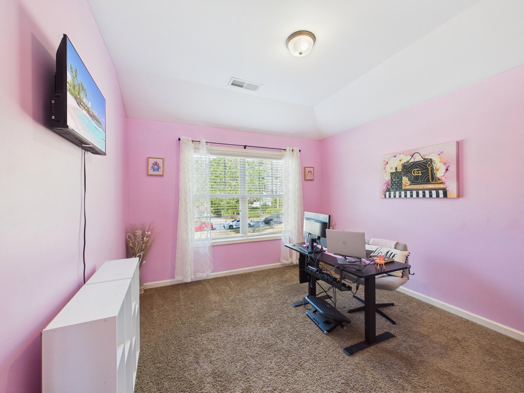 783 Sweetbay Parkway Hamilton, GA 31811 - Photo 33 of 46 a living room with furniture and a window