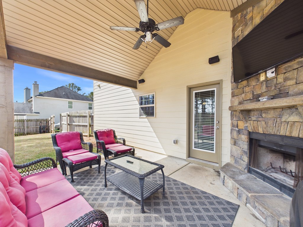 783 Sweetbay Parkway Hamilton, GA 31811 - Photo 37 of 46 COVERED PATIO WITH FIREPLACE