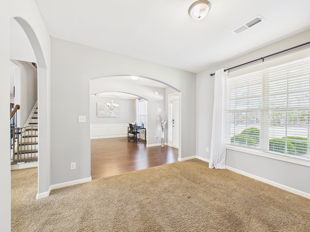 783 Sweetbay Parkway Hamilton, GA 31811 - Photo 4 of 46 wooden floor in an empty room with a window
