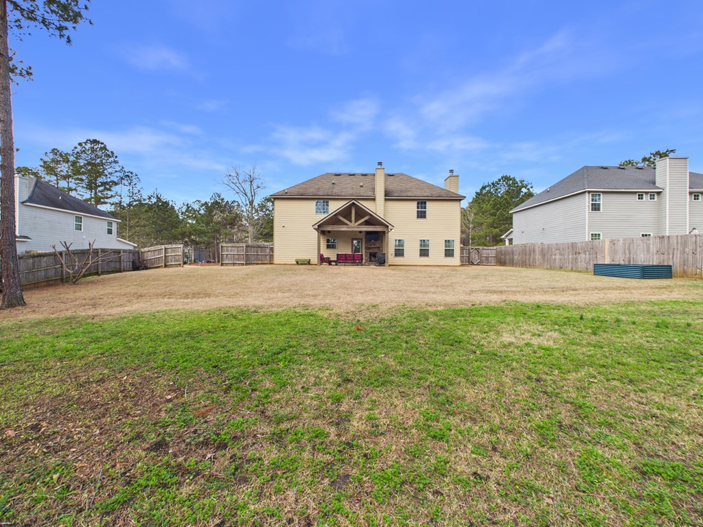 783 Sweetbay Parkway Hamilton, GA 31811 - Photo 42 of 46 a view of a house with a yard and a large tree
