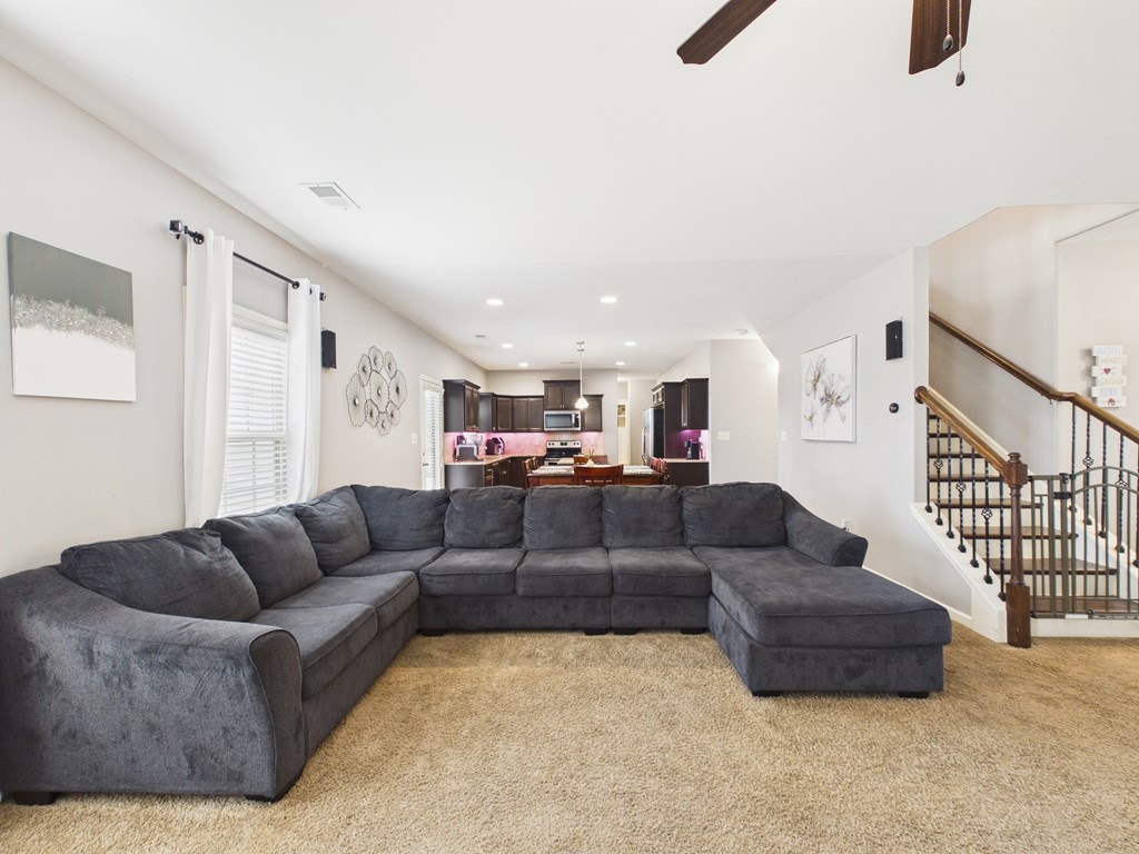 783 Sweetbay Parkway Hamilton, GA 31811 - Photo 9 of 46 a living room with furniture and a wooden floor