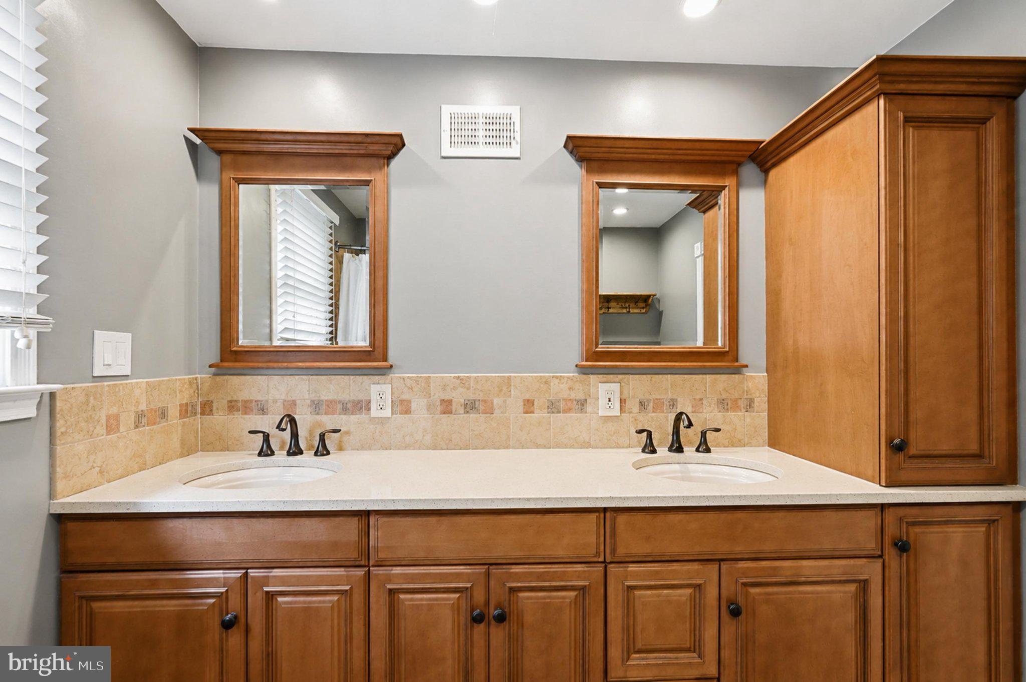 1002 Tannerie Run Road Ambler, PA 19002 - Photo 38 of 67 Elegant dual vanity in warm tones.