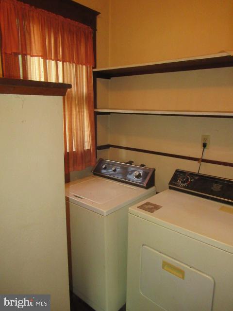 26 Potomac Drive Keyser, WV 26726 - Photo 11 of 15 a utility room with dryer and washer