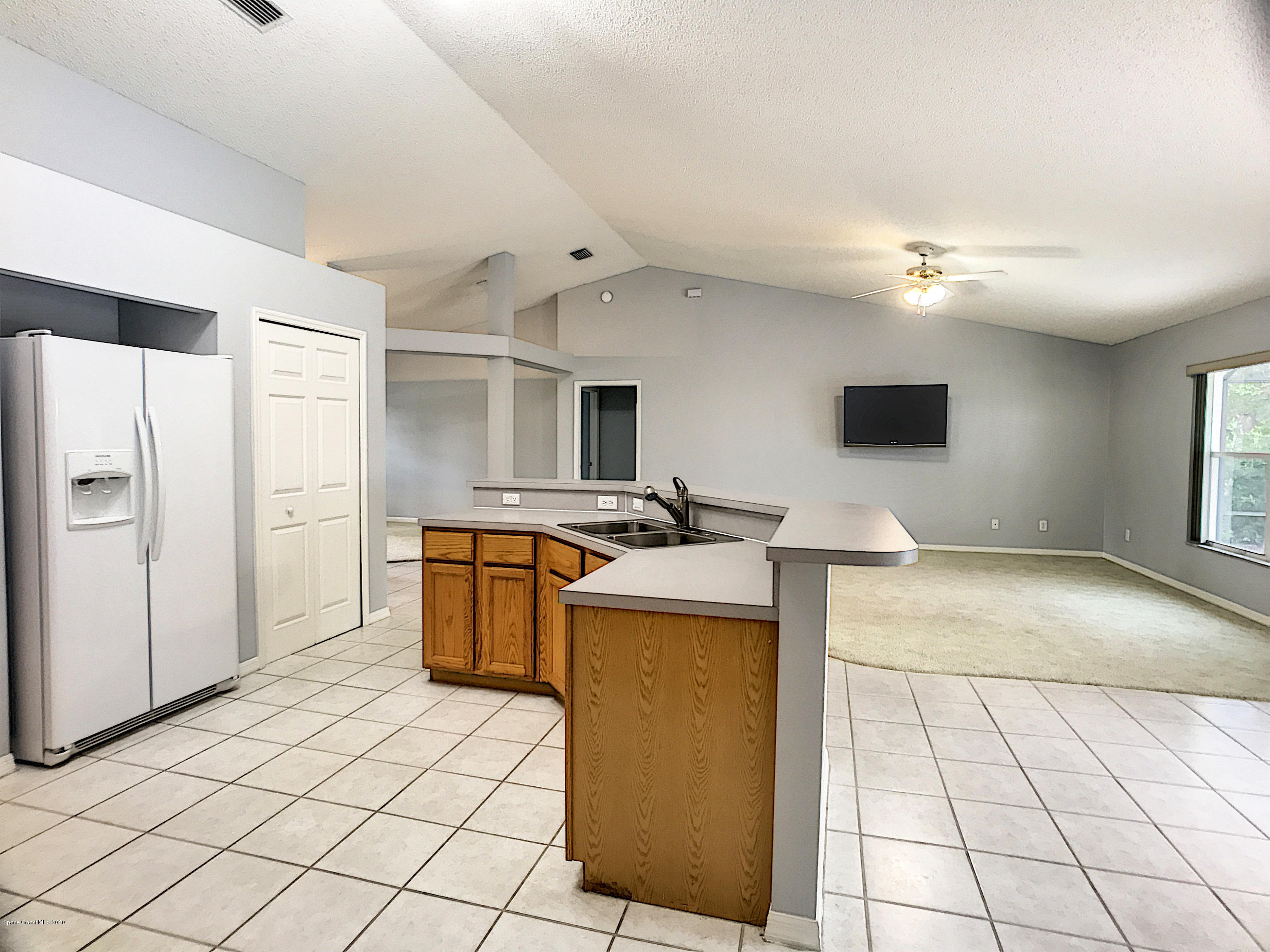 1253 Winding Meadows Road Rockledge, FL 32955 - Photo 21 of 29 Kitchen to FR