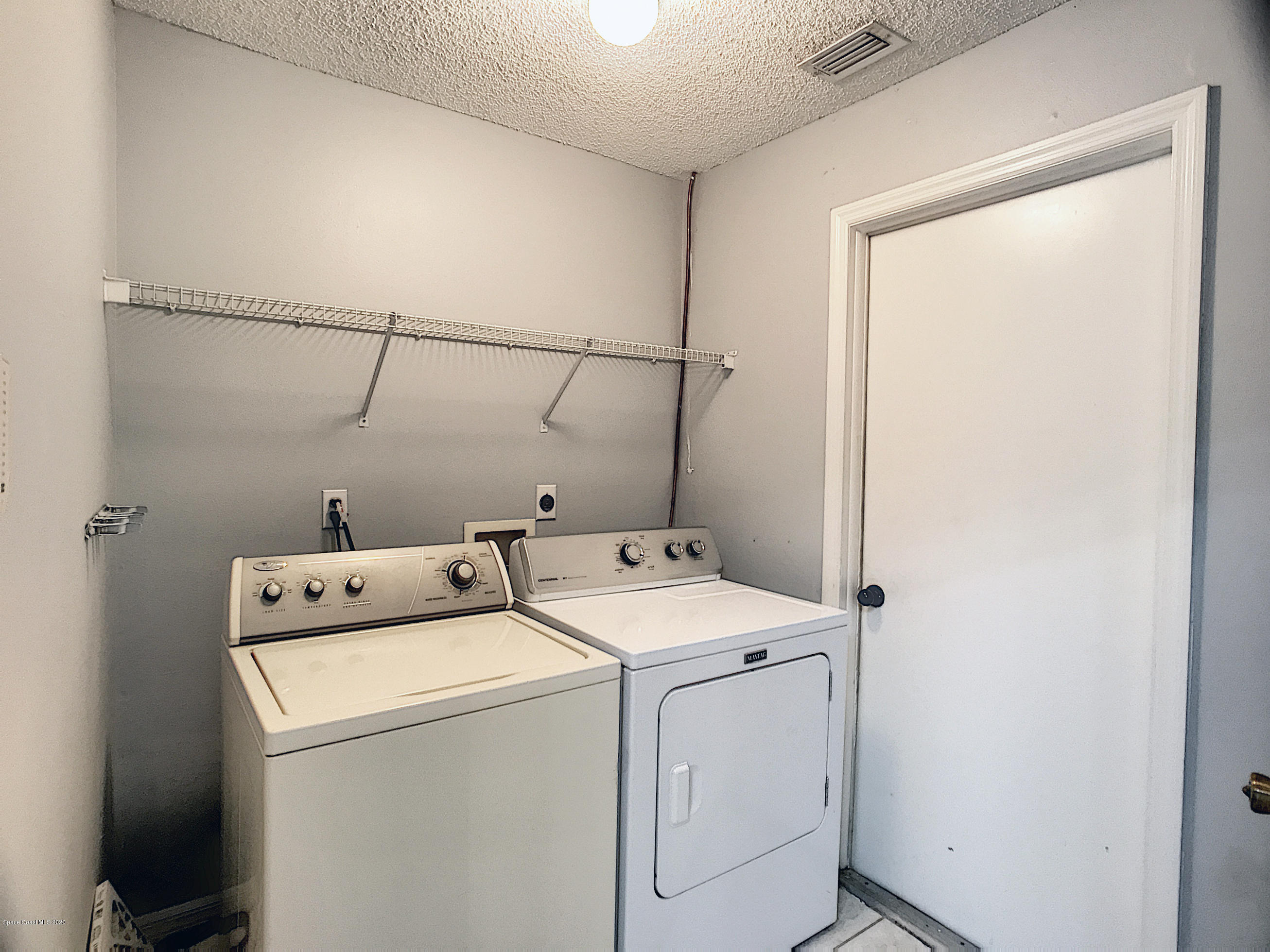 1253 Winding Meadows Road Rockledge, FL 32955 - Photo 23 of 29 Laundry room
