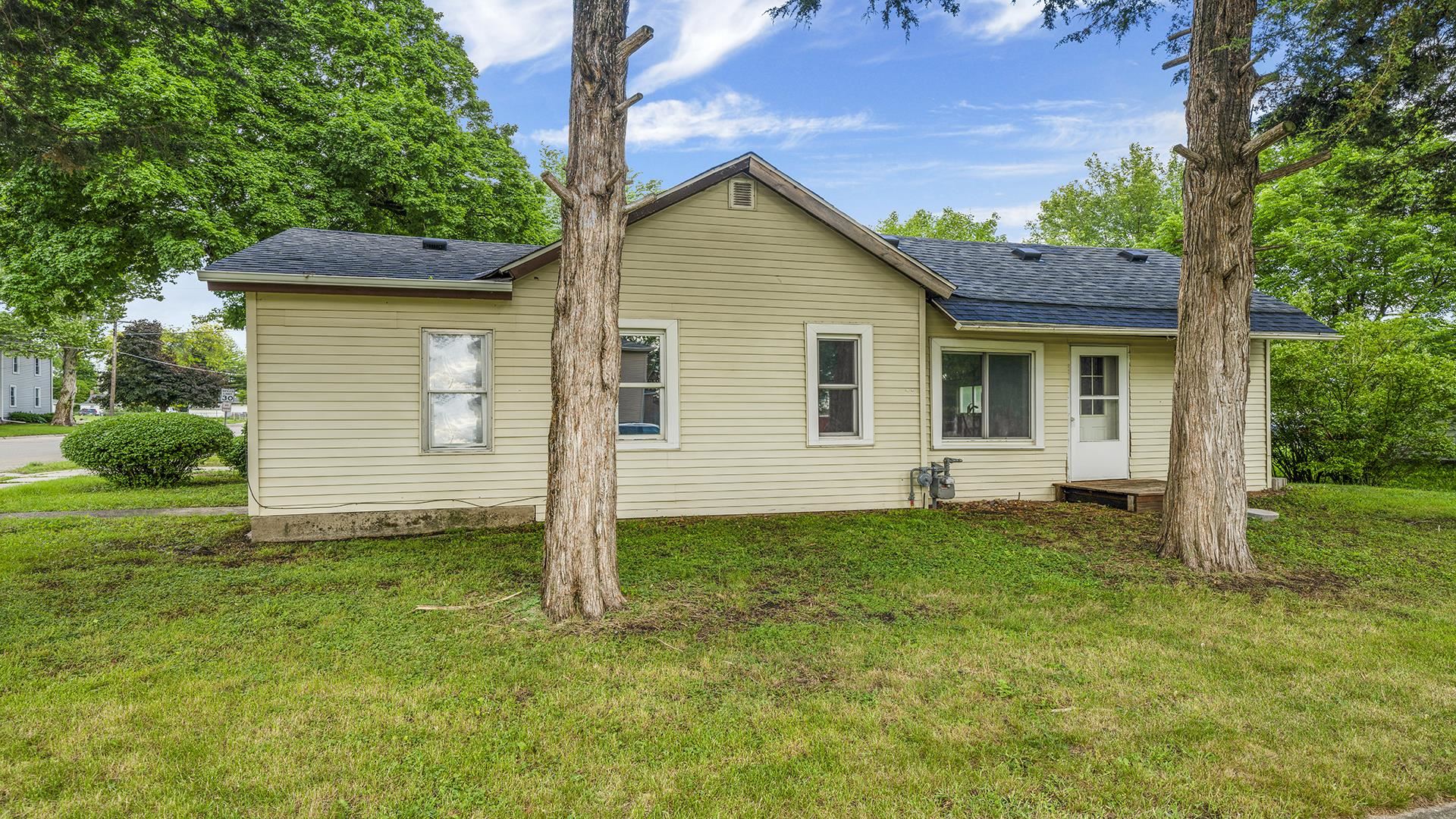 1122 1st Avenue Rochelle, IL 61068 - Photo 1 of 28 a view of a house with a yard