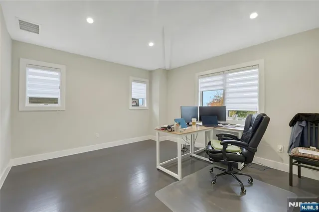 a view of a hallway with entryway