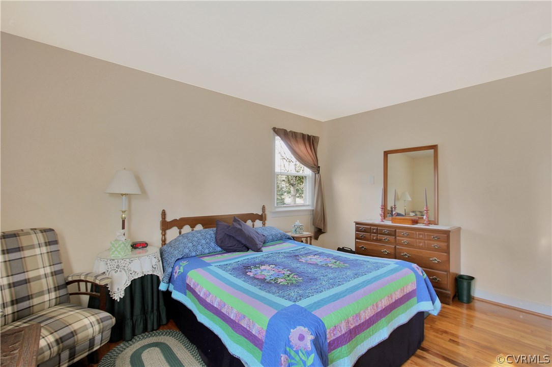10009 Wycliff Road Chesterfield, VA 23236 - Photo 13 of 24 a bedroom with a bed and window