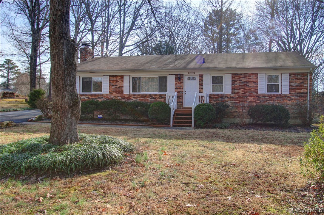 10009 Wycliff Road Chesterfield, VA 23236 - Photo 2 of 24 a front view of a house with garden