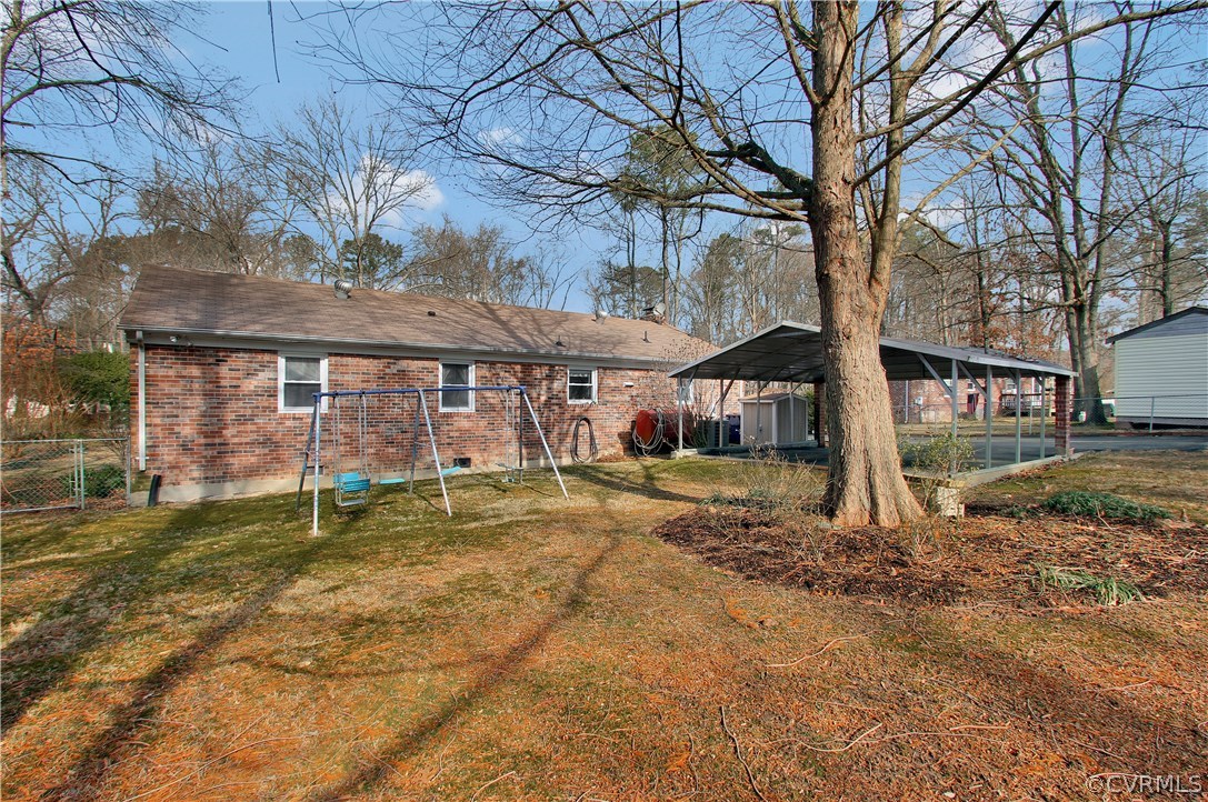 10009 Wycliff Road Chesterfield, VA 23236 - Photo 22 of 24 a house with trees in front of it