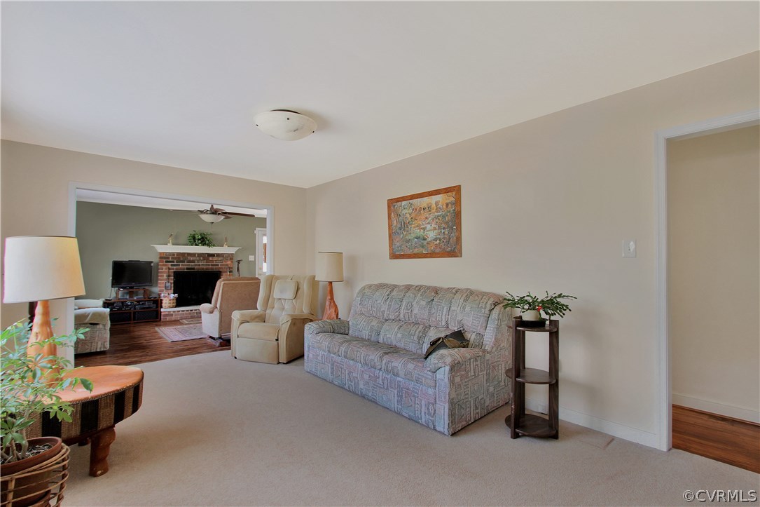 10009 Wycliff Road Chesterfield, VA 23236 - Photo 5 of 24 a living room with furniture and a fireplace