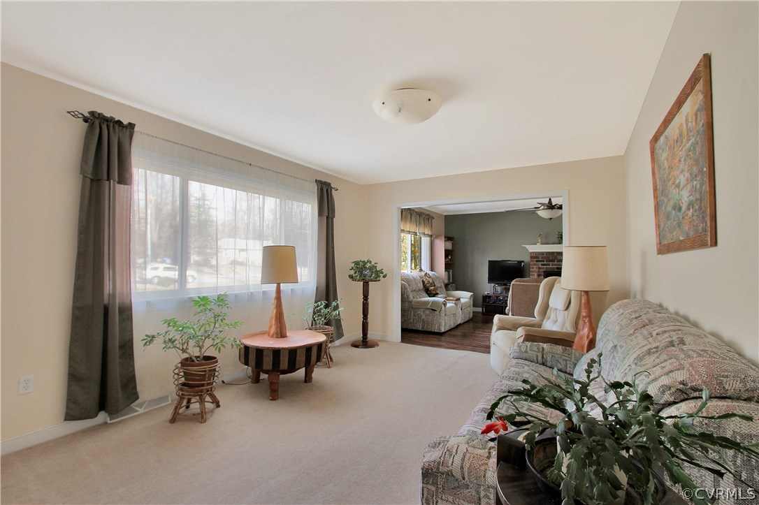 10009 Wycliff Road Chesterfield, VA 23236 - Photo 6 of 24 a living room with furniture and a large window