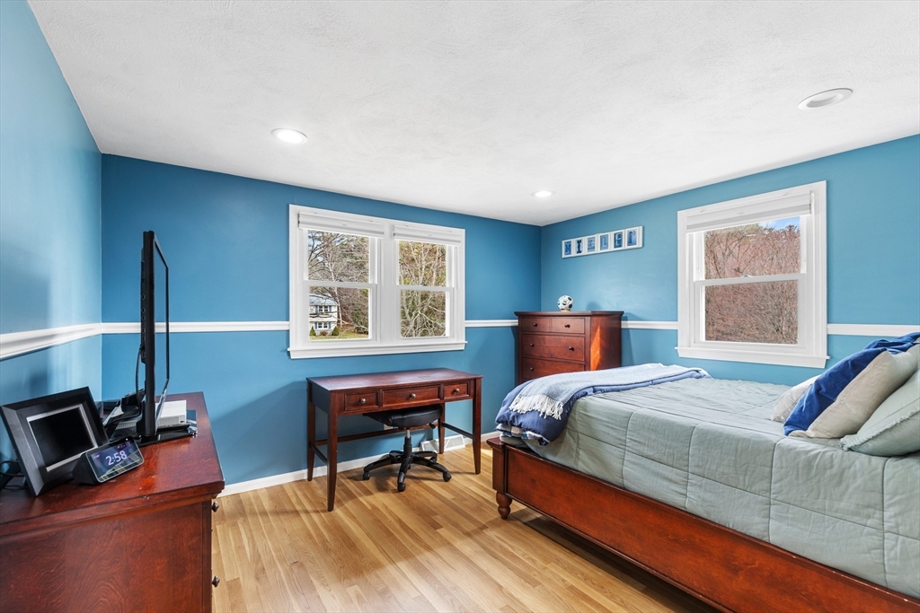 16 Bear Hill Road Billerica, MA 01821 - Photo 13 of 28 a bedroom with a bed and a couch