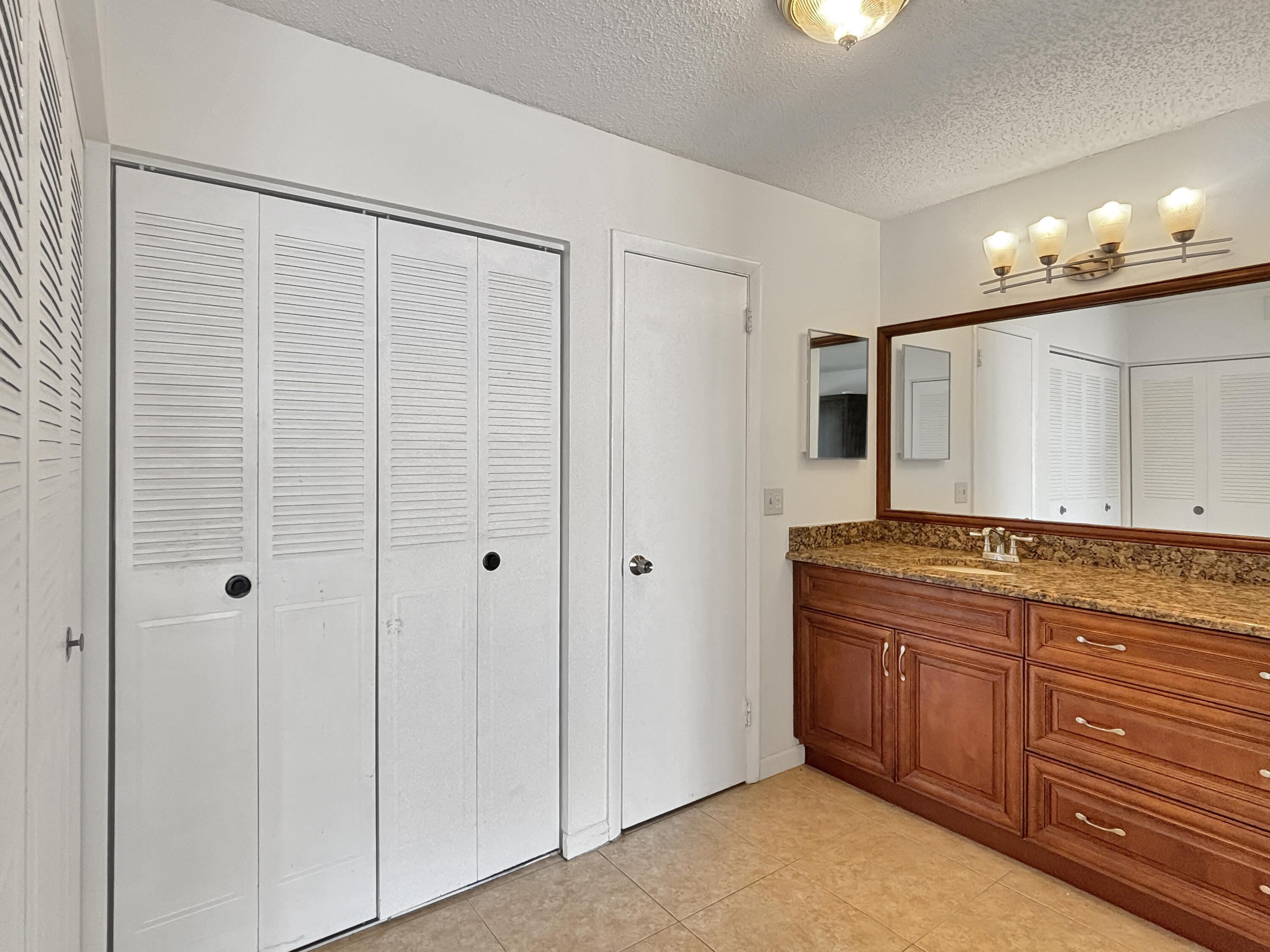 390 Golfview Road, Unit I North Palm Beach, FL 33408 - Photo 13 of 34 a bathroom with a shower and a sink