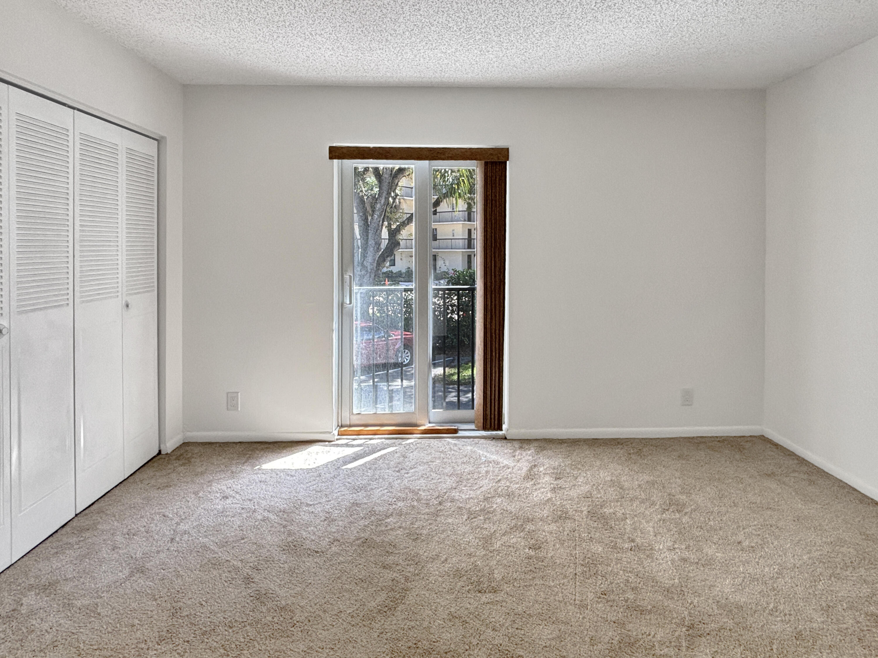 390 Golfview Road, Unit I North Palm Beach, FL 33408 - Photo 16 of 34 a view of an empty room with a window
