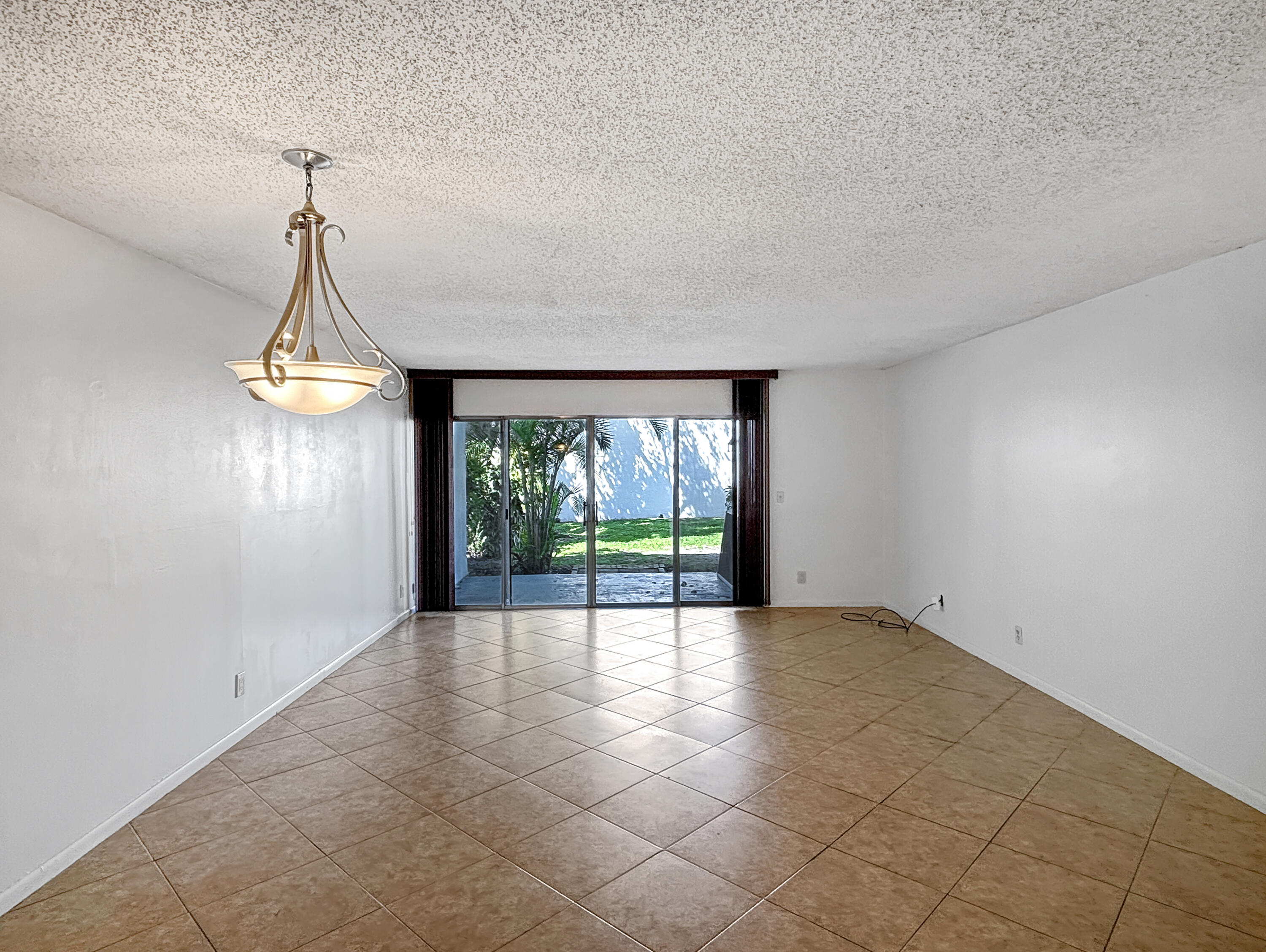 390 Golfview Road, Unit I North Palm Beach, FL 33408 - Photo 2 of 34 a view of an empty room with a window