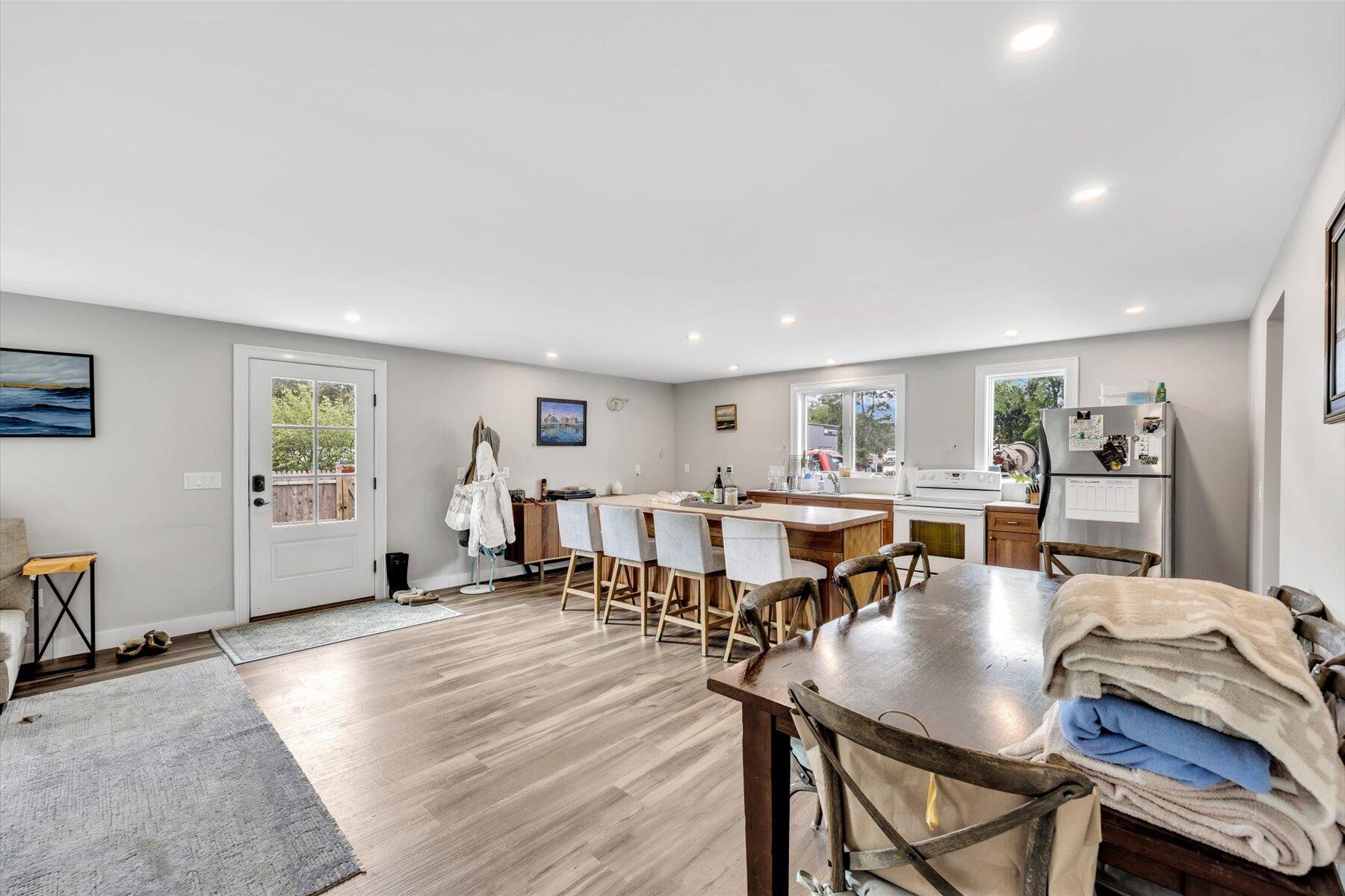 1562 State Hwy Route Eastham, MA 02642 - Photo 17 of 31 a living room with lots of furniture and wooden floor